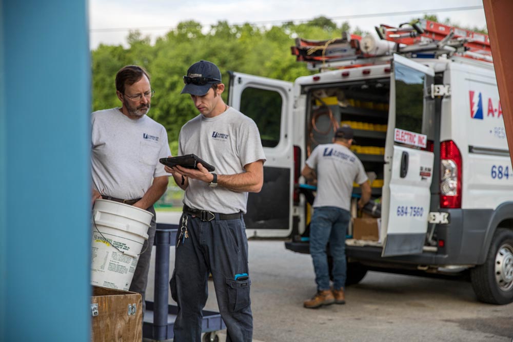 Team-inspecting-paperwork_AAE_174